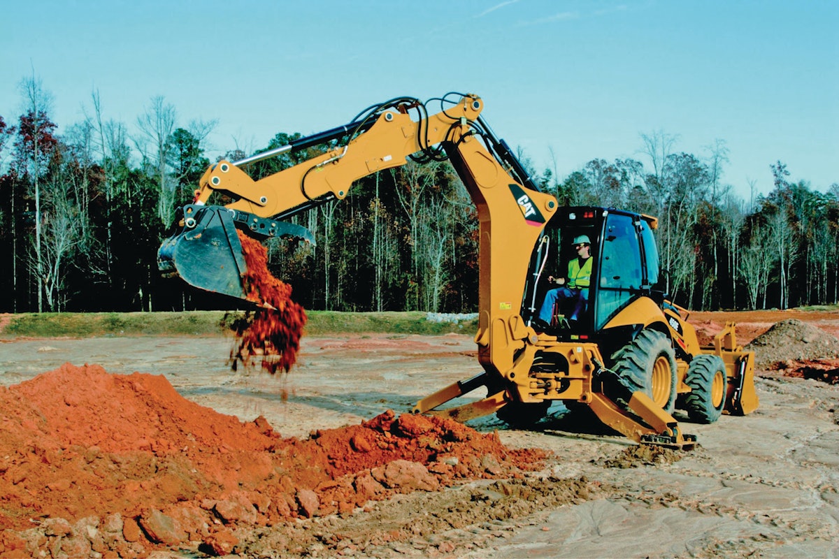 Экскаватор погрузчик траншея. Cat 450e. 450e Backhoe Loader. Земляные работы. Спецтехника земляные работы.