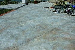 This overlay served as a cost-effective solution to an extensive cracking problem on the existing concrete.