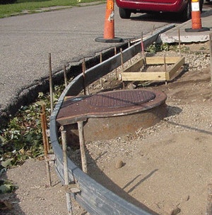 Reusable concrete forms a great choice for contractor's crosswalk curb ...
