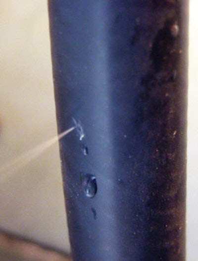 Even a small leak in a highly pressurized hydraulic hose line can pose a danger of injection risk.