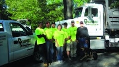 Bob Stanley, right, and the RS Asphalt Maintenance small but efficient and profitable crew. Stanley presented 'Staying Small By Choice – For Freedom and Prosperity' at the 1994 National Pavement Expo. Gail Frey, center, runs the office and schedules work – just as she did when Pavement wrote about Stanley in 1994.