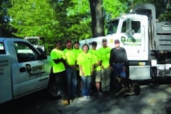 Bob Stanley, right, and the RS Asphalt Maintenance small but efficient and profitable crew. Stanley presented 'Staying Small By Choice – For Freedom and Prosperity' at the 1994 National Pavement Expo. Gail Frey, center, runs the office and schedules work – just as she did when Pavement wrote about Stanley in 1994.