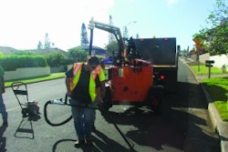 This Stepp melter/applicator has an optional overhead boom to reduce operator fatigue.
