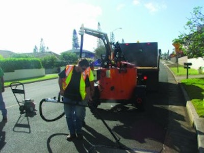 This Stepp melter/applicator has an optional overhead boom to reduce operator fatigue.