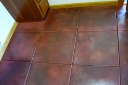BNC Concrete mixed chocolate brown Beer Stain from GG Innovative Products with lacquer thinner as the carrying agent to restain a residential floor where mechanical removal of coatings and stains was not allowed.