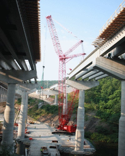 A Manitowoc 18000 is working on a bridge replacement project in Pennsylvania. The project involves completely replacing the Pohopoco Creek and Lehigh River Bridge structures on the Northeast Extension of I-476 in Carbon County, PA.