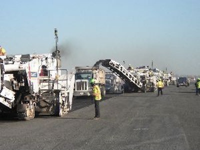 By using Topcon GPS, Intercounty Paving Associates was able to simultaneously operate five Roadtec RX-900 milling machines to speed production at the John F. Kennedy Airport. This would have been impossible using conventional techniques.