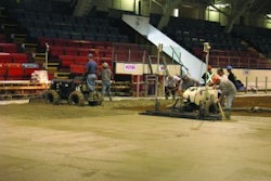Heating and cooling lines under the concrete prevent large equipment from being on the floor, so Bravo Cement outfitted a Somero PowerRake and CopperHead screed with flotation tires to level and grade the concrete.