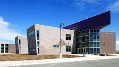 The Evie Garrett Dennis Campus is a K-12 public school for Denver Public Schools constructed by Saunders Construction, Inc. The campus incorporates many of today's diverse tilt-up finishes including painted panels with articulated rustications, cast-in brick, sand blasted, integrally colored panels and many types of formliners converging together in one plane.