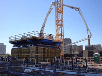 This new Super Climber System consists of five hydraulic cylinders capable of lifting 500,000 lbs., including the entire working floor, as well as a Putzmeister concrete placing boom and 3,200 sq. ft. of formwork, from lift to lift.