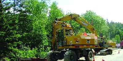 The Lane Construction Corp. uses wheeled excavators for added mobility and ease of travel.