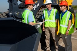 J.H. Reid, South Plainfield, NJ, takes delivery of the first John Deere 744K IT4 wheel loader. From left to right: Doug Lehmann, engineer, John Deere Dubuque Works, Eric Reid, president, J.H. Reid, and Jon Robustelli, president, JESCO, a John Deere dealership serving all of New York City, Westchester County and Long Island.