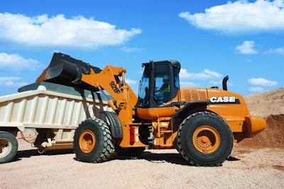The 921F is slightly downsized with a 4 3/4 cubic yard bucket and 242 hp Isuzu diesel.