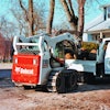 Application and ground conditions will determine whether a skid-steer equipped with tracks or a compact track loader would be the best option.