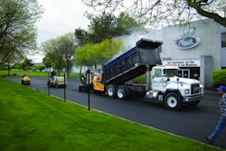 The first lift of the parking lot was a 2.5-in. lift of binder which was then compacted to 2 in. A second 2.5-in. lift and compaction to 2 in. followed.