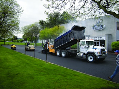 The first lift of the parking lot was a 2.5-in. lift of binder which was then compacted to 2 in. A second 2.5-in. lift and compaction to 2 in. followed.