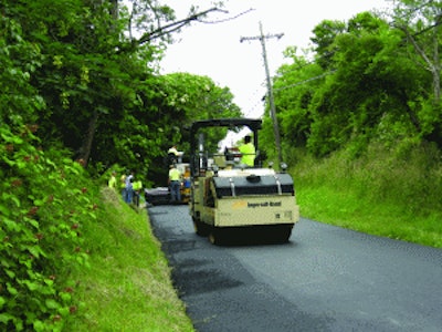 The crew had both Ingersoll Rand DD-90 and DD-90HF rollers on site. 'Breakdown was done at placement temperatures, roughly 250 degrees F. Finish rolling was done about 180 degrees F,' says Annette G. Smith, project leader at PQ Corp.