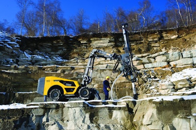 # Compact radio-controlled, all-wheel drive surface drilling rig ideal for small construction jobs, trench drilling and rock reinforcement applications.