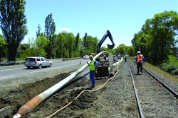 Pipe bursting allows new pipe to be installed with minimal disruption to the surrounding area. Here, Team Ghilotti uses a TT Technologies Grundoburst system to pull back new 12-in. C-900 fusible PVC pipe in St. Helena, CA.
