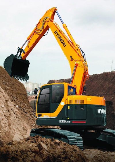 Excavator in Hyundai's 9 Series with left side control console that rises up to an upright position