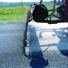 Tip angle, spacing of tips on the spray bar, and viscosity of material all affect spray pattern of sealer.