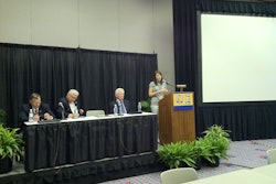Dr. Heather Brown, right, speaks about the new concrete-focused MBA through CIM. Seated, from left to right: Mike Schneider, Senior VP at Baker Concrete and National Steering Committee member for CIM; Dean Jim Burton of the Jones College of Business at MTSU; and David Vickers, National Steering Committee member for CIM.