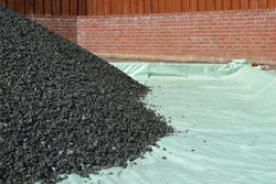 The PERC pervious concrete infiltration fabric is placed as a separation layer between the softer, less compacted soil base and the stone filter layer.