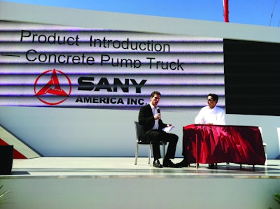 David Wright, left, is the engineering manager for concrete pumps at SANY America. The company announced the introduction of two pumps trucks to the North American market during CONEXPO-CON/AGG 2011.