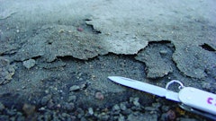 Scaling, above, and premature surface wear typically occur when contractors mix bleedwater into the surface or trap bleedwater and air directly beneath the surface.