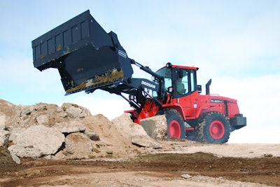 Parallel loader lift linkage visibility down the center of the lift arms allow the operator to see the ground, truck or work area in front of the machine when placing loads.