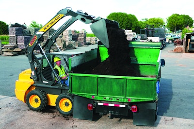 Five models in the New Holland 200 Series include the vertical lift Super Boom design.