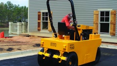 When completing chipseal projects, pneumatic rollers will set the aggregate in the oil without breaking the edges of the rock. Courtesy Basic Equipment, www.basicequipment.net.