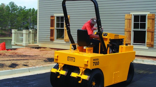 When completing chipseal projects, pneumatic rollers will set the aggregate in the oil without breaking the edges of the rock. Courtesy Basic Equipment, www.basicequipment.net.