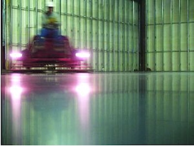 This unpolished, unsealed floor shows the finish Birdwell & Associates provides its customers, allowing for exposed concrete finishes over alternative wear surfaces.