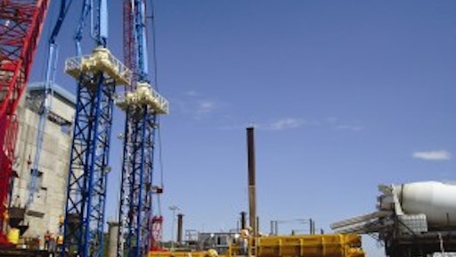 SAB proposed a complete system approach made up of placing booms, truck-mounted concrete boom pumps, diversion valves, remix hoppers and trailer pumps as a solution for placing the tremie concrete for the Olmsted Locks and Dam project.