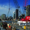 Because the harbor lock gate replacement called for mounting the crane on a barge, Central Contractor Service selected a 300-ton-capacity Manitowoc 4100W S-3 Ringer crane with a capacity-enhancing ringer attachment.