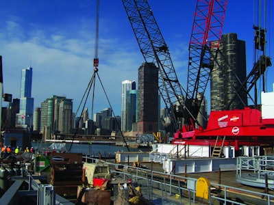 Because the harbor lock gate replacement called for mounting the crane on a barge, Central Contractor Service selected a 300-ton-capacity Manitowoc 4100W S-3 Ringer crane with a capacity-enhancing ringer attachment.