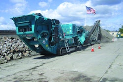 The Pegson XH320SR is shown at work crushing concrete rubble at one of Ghilotti Brothers' four recycling yards.