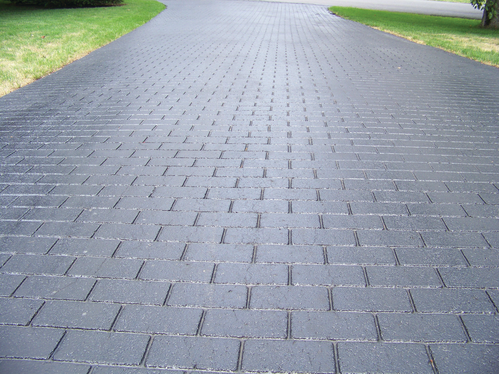 Premium Photo | Decorative creating of pavement with block paving, brick  paving