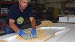 Buddy Rhodes, owner of Buddy Rhodes Concrete Products, achieves the Pressed Surface look in this precast application.