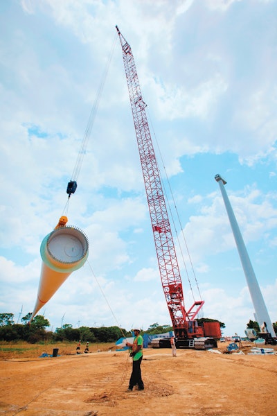 A Manitowoc 16000 crawler crane fitted with a wind attachment is erecting 204 turbine towers on a Mexico wind farm.