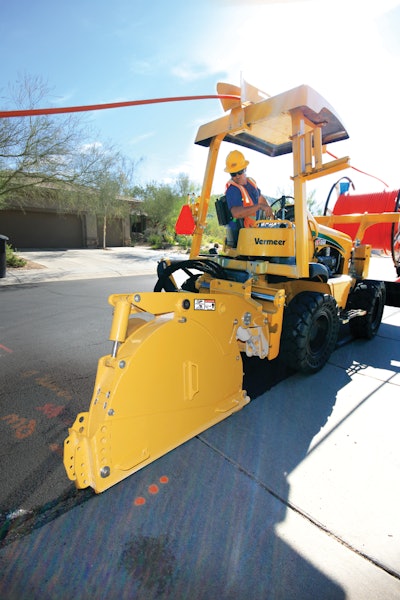 The Vermeer MTR12 microtrencher attachment enables Team Fishel's installation crew to place more conduit, faster and with less cost and less site disturbance than other methods.