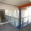 At Miramar College, Surfacing Solutions polished 9,000 square feet of floors, including this second floor area. Crews had to use a lift to get grinders through a framed window because elevators were not working.
