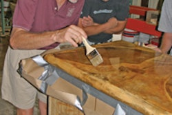 Doug Bannister, The Stamp Store, demonstrates on a countertop during a training class. Getting trained should be the first step when starting in the countertop business.