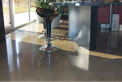 The office space at CONCRETEWORKS Design features polished floors, acid stained with densifiers and water-based finish coats.