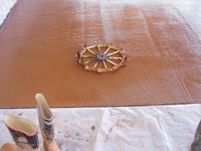 Recycling artists utilize materials that might otherwise end up in the landfill. We did some recycling art of our own by embedding a sprocket we found on our property in fresh concrete prior to polishing.