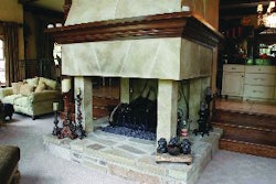 Michael Pizzolongo Sr. uses stucco and concrete to create decorative pieces, like this fireplace, at a fraction of the weight when using brick and mortar.