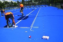 McConnell, Tennis Services help ready new surfaces for Australian Open.