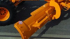 Because they are consistently engaged with material, end bits need to be monitored closely and replaced often. Tightening the top two bolts on the guide takes the play out of the slide.