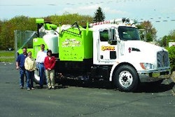Dave Fisher, Hannah Smith, Tom Kuhns, and Lesa Kuhns (from left) with Capitol Sweeping Services' new infrared repair machine, the contractor's next step in bringing services in-house to help stabilize cash flow, keep employees busy, and become even more essential to its customers.